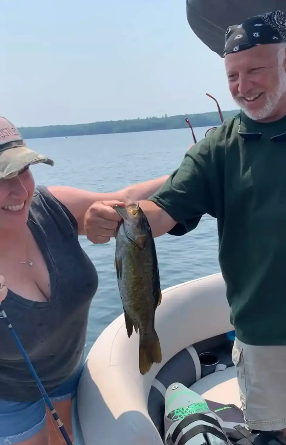 Guided pontoon family boat fishing tour on a northern Wisconsin lake