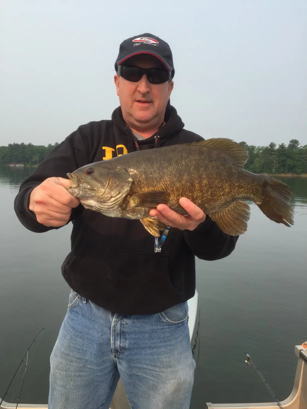 Guided pontoon family boat fishing tour on a northern Wisconsin lake